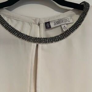 Jennifer Lopez Cream Top with Silver Embellishments